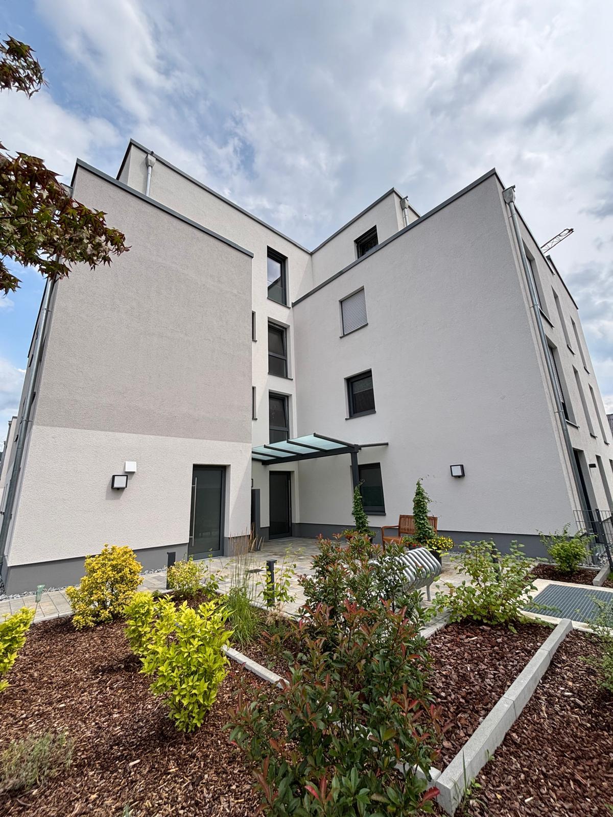 Neubau von 4 Mehrfamilienhäusern mit Tiefgarage